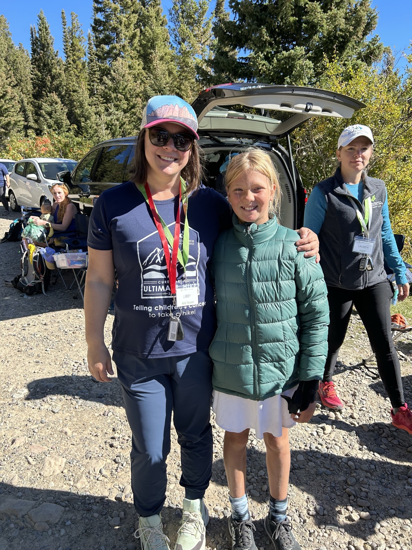 An Ultimate Hike participant and a young supporter together after the event