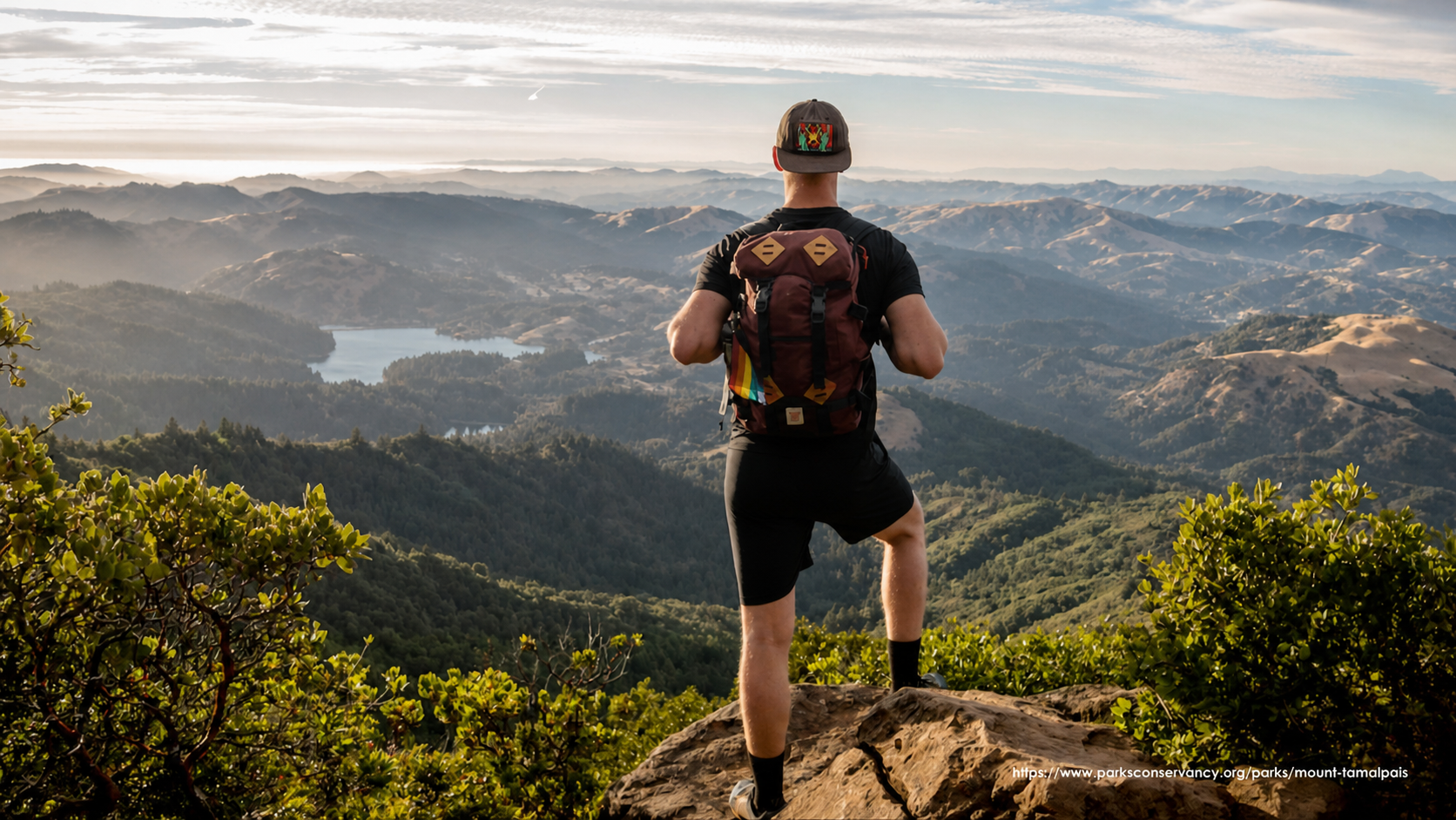 A hiker overlooking the Mt. Tamalpais landscape