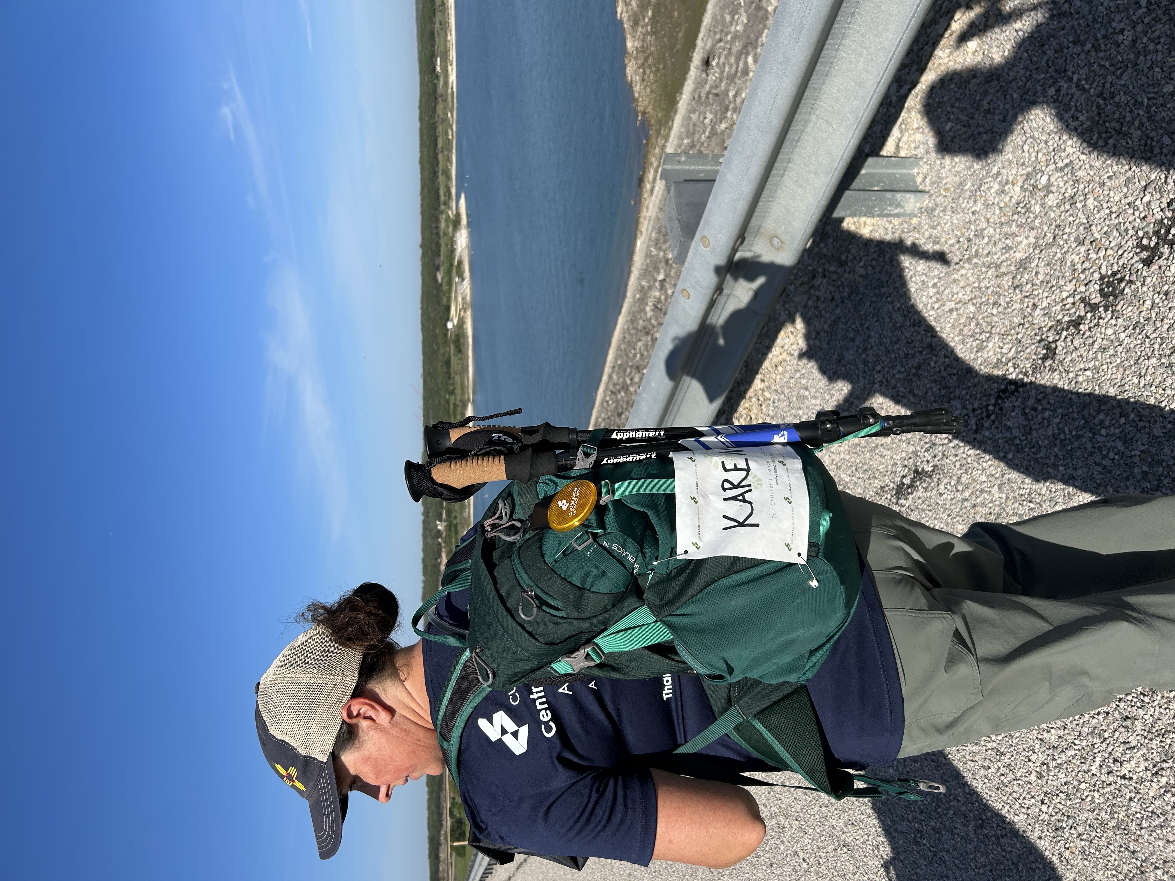 An Ultimate Hike participant on a Central Texas trail overlooking the water