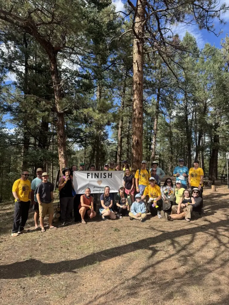 Hikers celebrating at the finish line