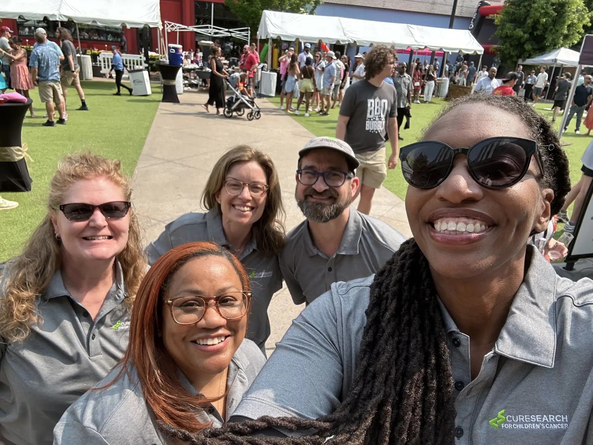 CureSearch volunteers at a community event