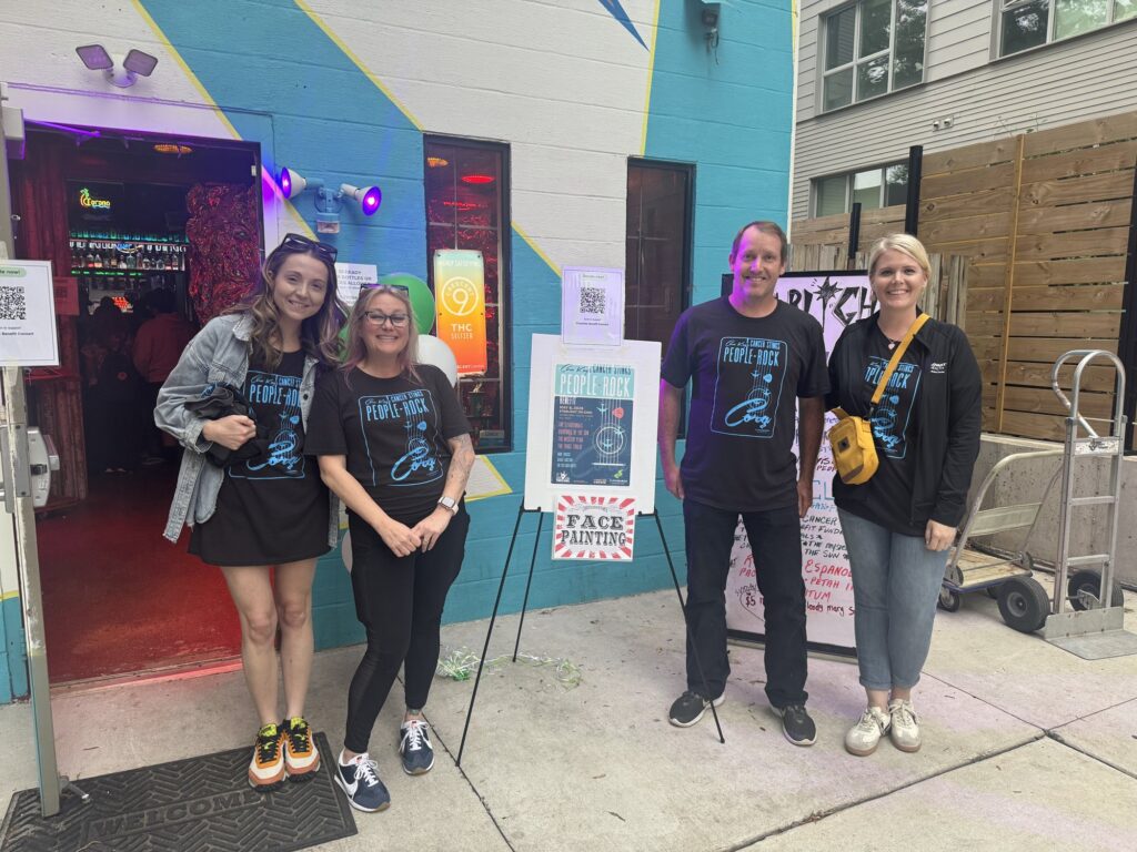 Volunteers at a community fundraiser