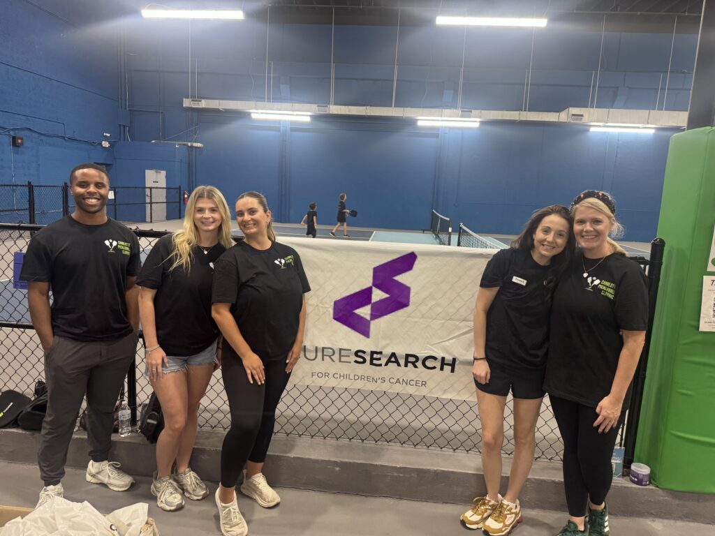 CureSearch volunteer leaders at a community event