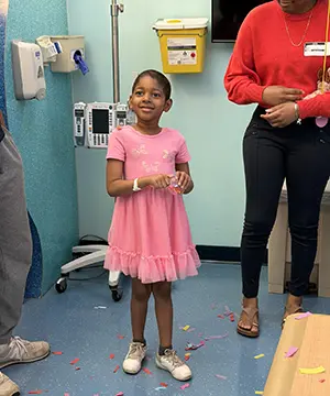 From Crisis to Celebration: The Resilient Journey of Amari and the Advancements in Pediatric Oncology for Wilms Tumor Survivorship 2 When Hope Rang the Bell: Amari’s Pediatric Cancer Survivorship Journey